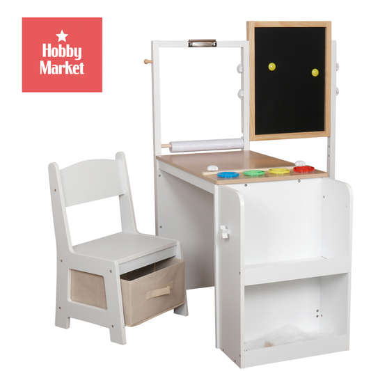 Escritorio infantil blanco de madera con silla, pizarra, portarrollos de papel y estantes de almacenamiento integrados.
