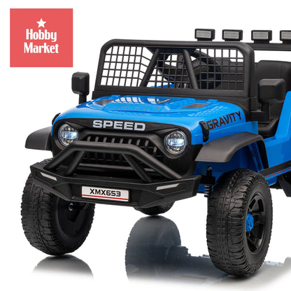 Jeep eléctrico infantil azul de 12V con luces LED, rejilla frontal, parachoques robusto y diseño todoterreno realista.