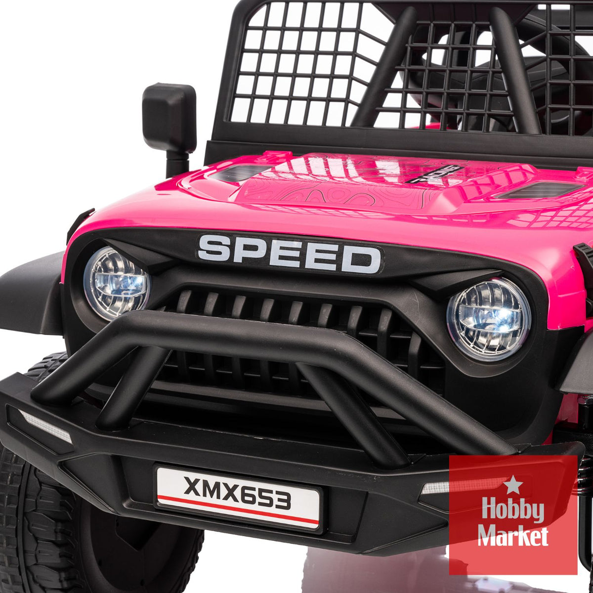 Jeep eléctrico infantil rosado de 12V con luces LED, defensa frontal negra y diseño robusto tipo todoterreno.