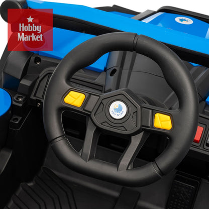 Volante negro de buggy eléctrico infantil azul con botones amarillos y logo central Toy Star en el tablero.