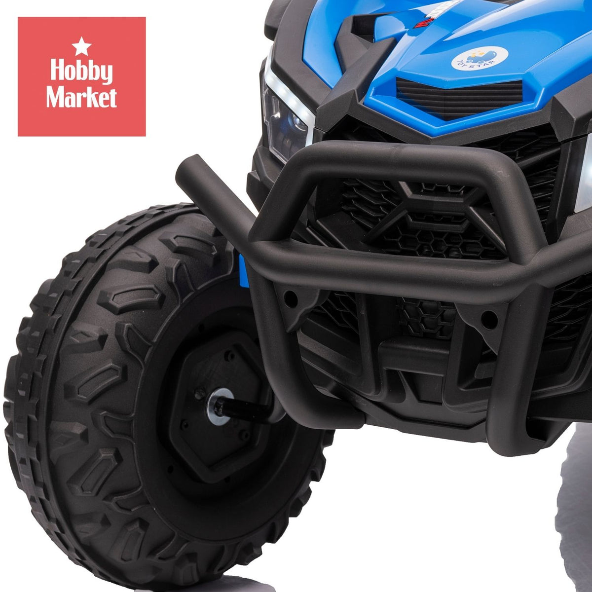 Buggy eléctrico infantil azul con diseño todoterreno, parachoques frontal negro y ruedas de gran tracción.