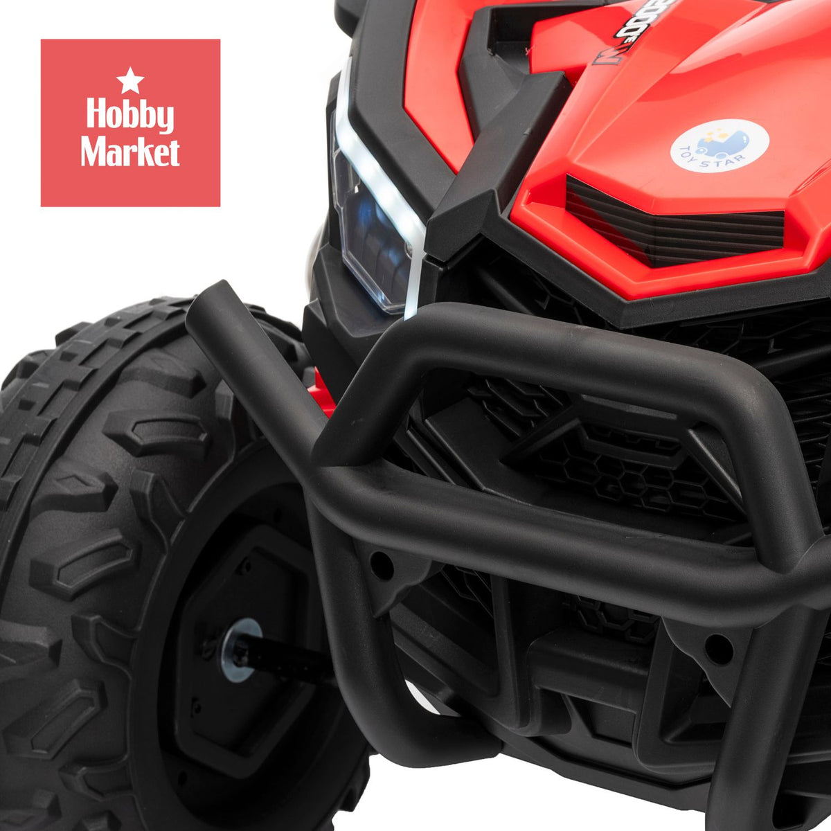 Buggy eléctrico infantil rojo con diseño todoterreno, parachoques negro resistente y luces LED delanteras.