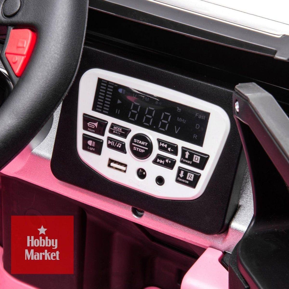 Panel de control digital con pantalla y botones multimedia en vehículo infantil Cyber rosa de 12V.