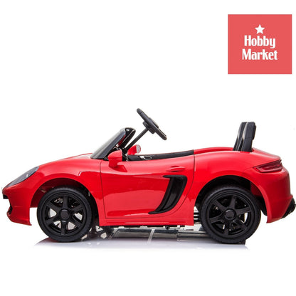 Auto eléctrico infantil XL rojo de dos plazas con diseño deportivo, ruedas negras y volante, vista de perfil.