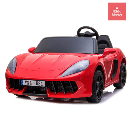 Auto eléctrico infantil XL color rojo de 24V con dos plazas, diseño deportivo, volante y detalles realistas.