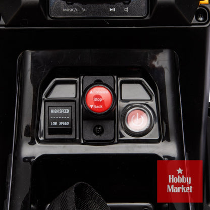 Panel de control negro de tractor infantil con interruptor de velocidad, botón de marcha adelante, atrás y encendido.